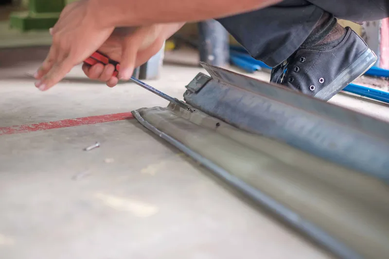 Engineer checking the assembly of a roller shutter